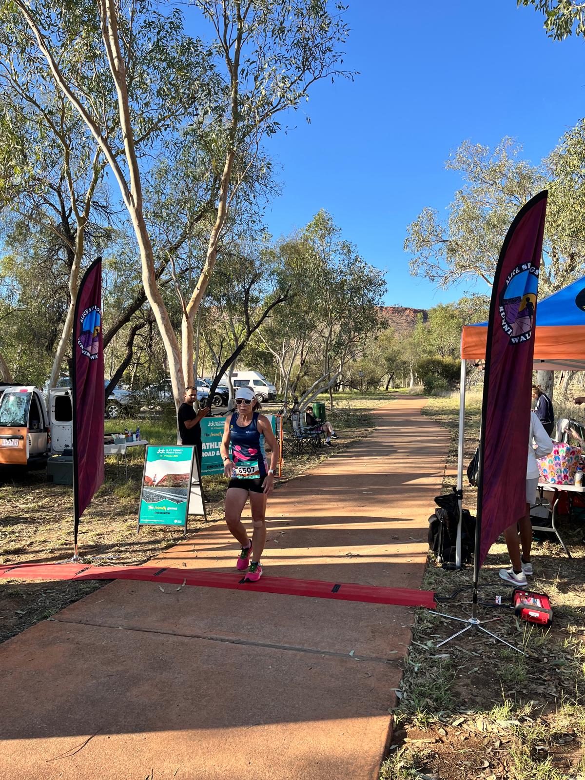 Debbie Page is first across the line in the 5km Alice Springs Masters Games 2026